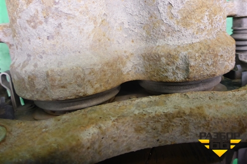 Суппорт передний левый (581102W700) для Hyundai Grand Santa Fe с 2012-2018г (Гранд Санта Фе)