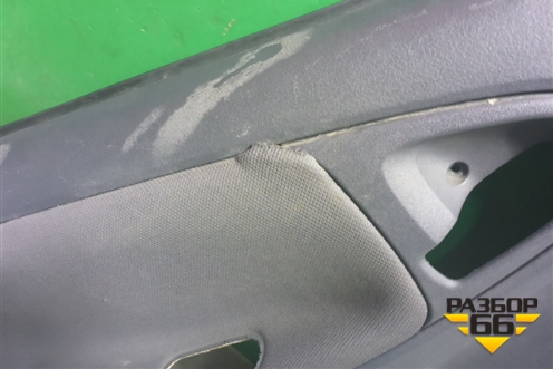 Обшивка двери задней левой под механику (6761452010) для Toyota Yaris с 1999-2005г (Ярис)
