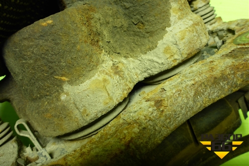 Суппорт передний левый (581102W700) для Hyundai Santa Fe с 2012-2018г (Санта Фе)